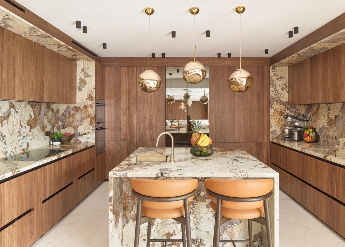 Villa Constance kitchen in walnut and natural stone